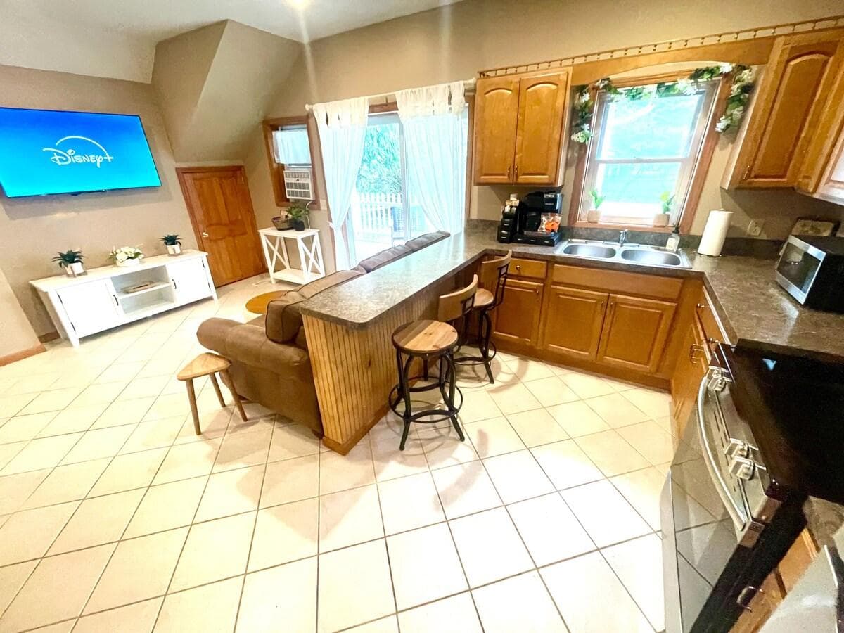 Beautiful, spacious kitchen and living room w/ 55" Smart TV